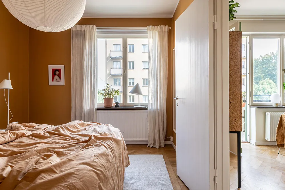 Acentes cálidos de terracota y otros en el diseño de un apartamento pequeño (49 m²) - Gallery image 5