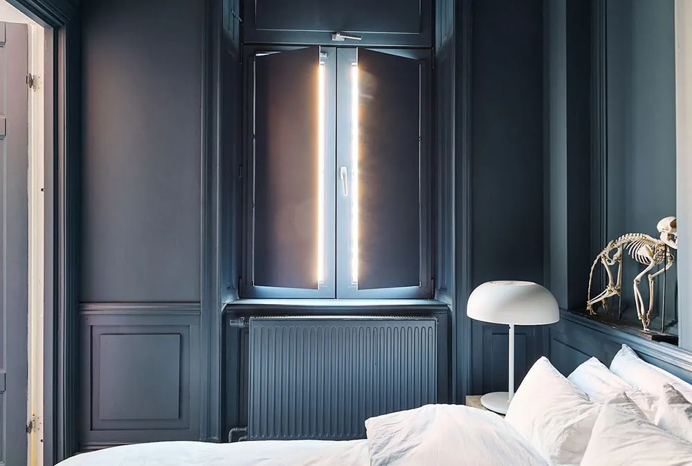 Increíble pequeña apartamento con paredes azules y decoración artística (33 m²) - Gallery image 12