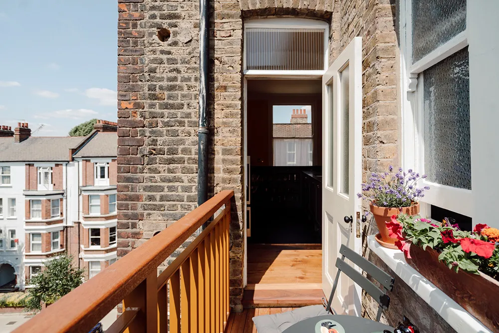 Mint Walls, Yellow Kitchen and Orange Sofa: Modern Interior in a London Townhouse - Gallery image 10