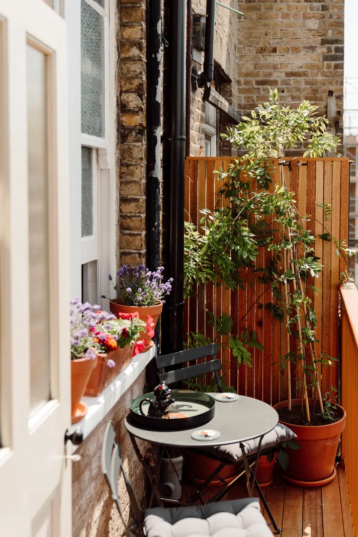 Mint Walls, Yellow Kitchen and Orange Sofa: Modern Interior in a London Townhouse - Gallery image 9