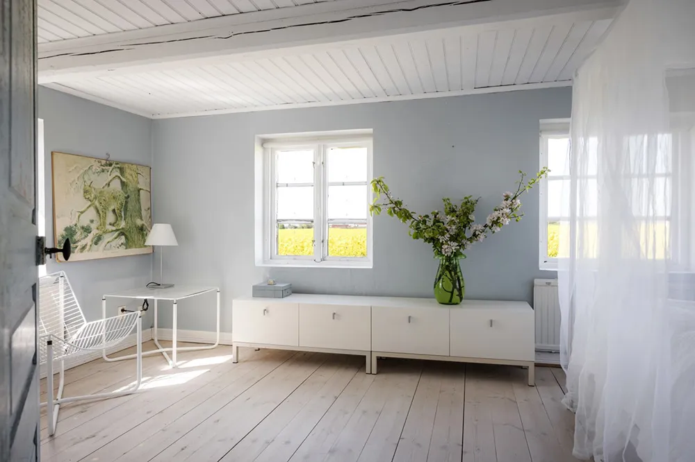 White Interiors of a Historic Farm Near the Sea in Sweden - Gallery image 9