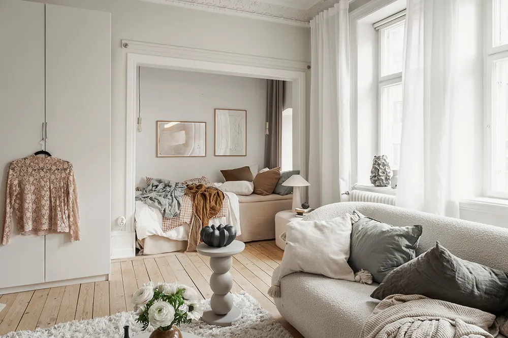 Miękki i ciepły skandynawski интерьер małej mieszkania 51 m² - Gallery image 13