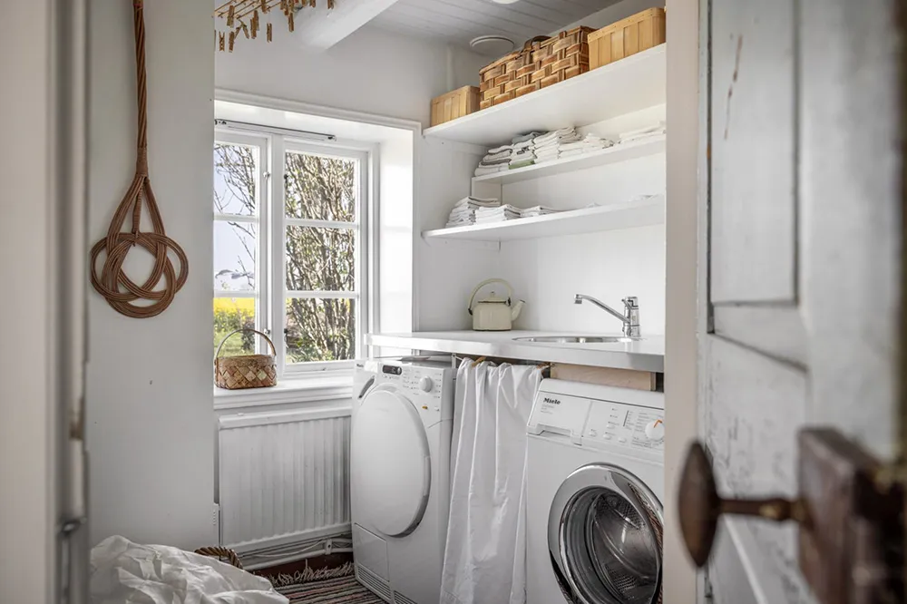 White Interiors of a Historic Farm Near the Sea in Sweden - Gallery image 14