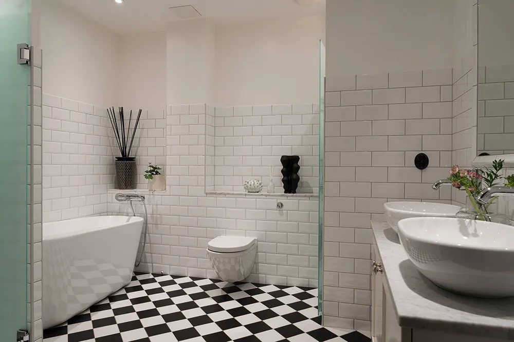 Planification ouverte et accents de couleur élégants : appartements à Stockholm - Gallery image 19