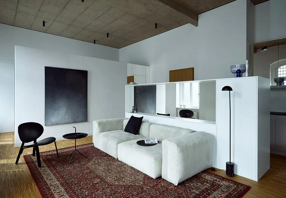 Béton et minimalisme élégant : petit loft à Wrocława (50 m²) - Gallery image 2