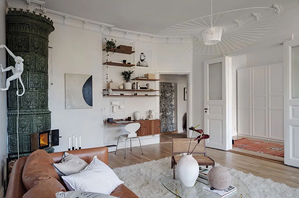 Grüne Herd und warme Akzente: verfeinertes Interior einer Wohnung in Göteborg (94 qm) - Gallery image 5