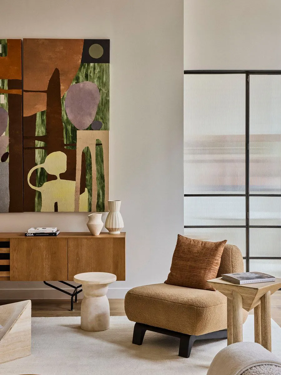 Modny dekor w ciepłych tonach i otwarte przestrzenie: loft w Nowym Jorku - Gallery image 1