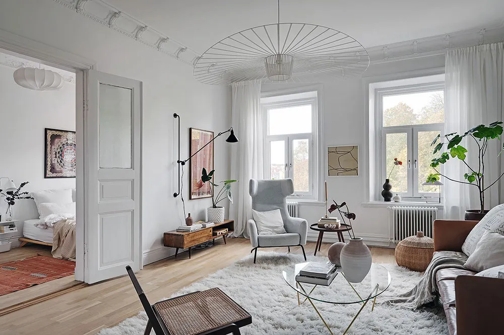 Grüne Herd und warme Akzente: verfeinertes Interior einer Wohnung in Göteborg (94 qm) - Gallery image 1