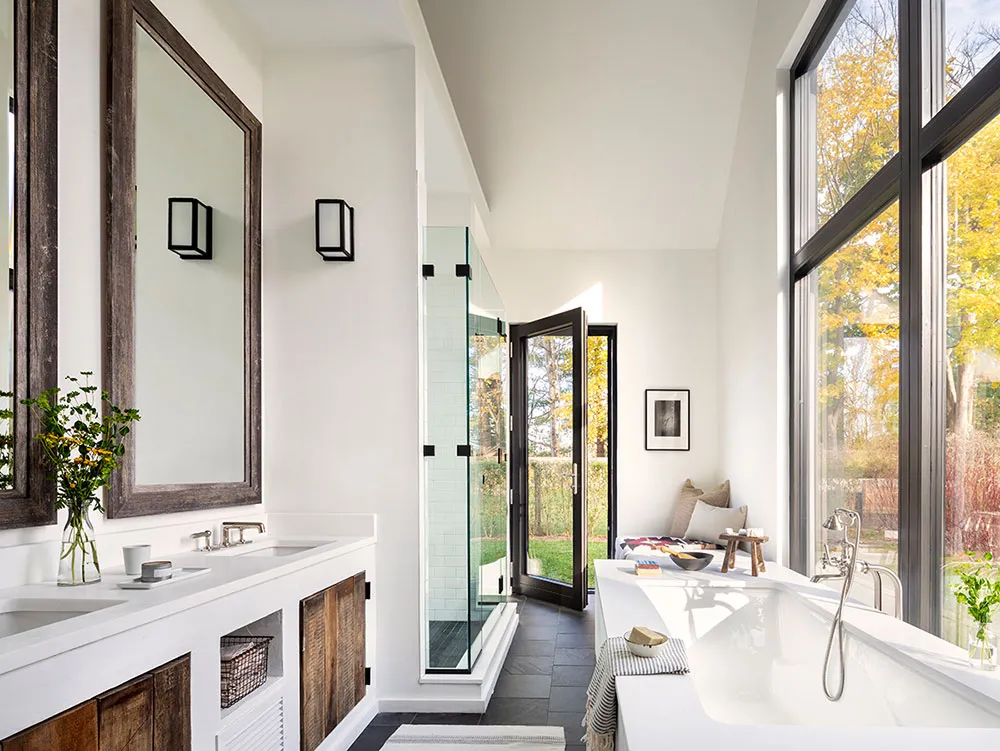 Intérieurs très lumineux d'un moderne cottage noir en pleine nature - Gallery image 17