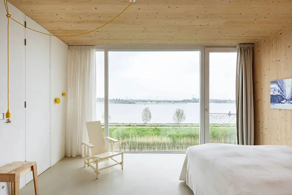 Calor de madera natural en el diseño de un townhouse moderno en Ámsterdam - Gallery image 18