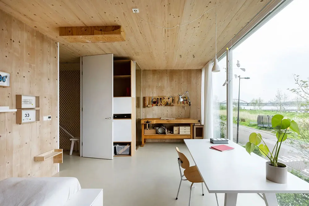 Calor de madera natural en el diseño de un townhouse moderno en Ámsterdam - Gallery image 15