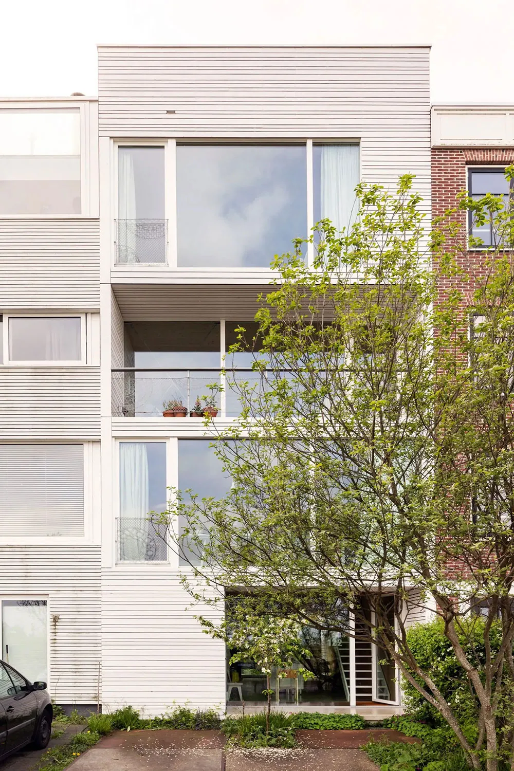 Calor de madera natural en el diseño de un townhouse moderno en Ámsterdam - Gallery image 22