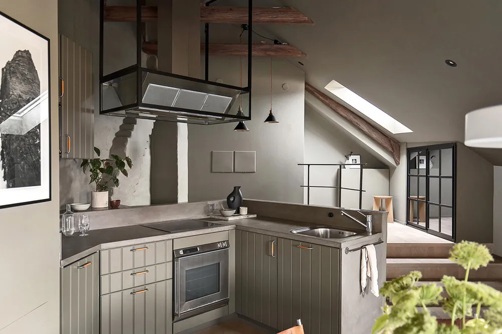 Une intéressante appartement de mansarde avec murs olive et terrasse (66 m²) - Gallery image 2