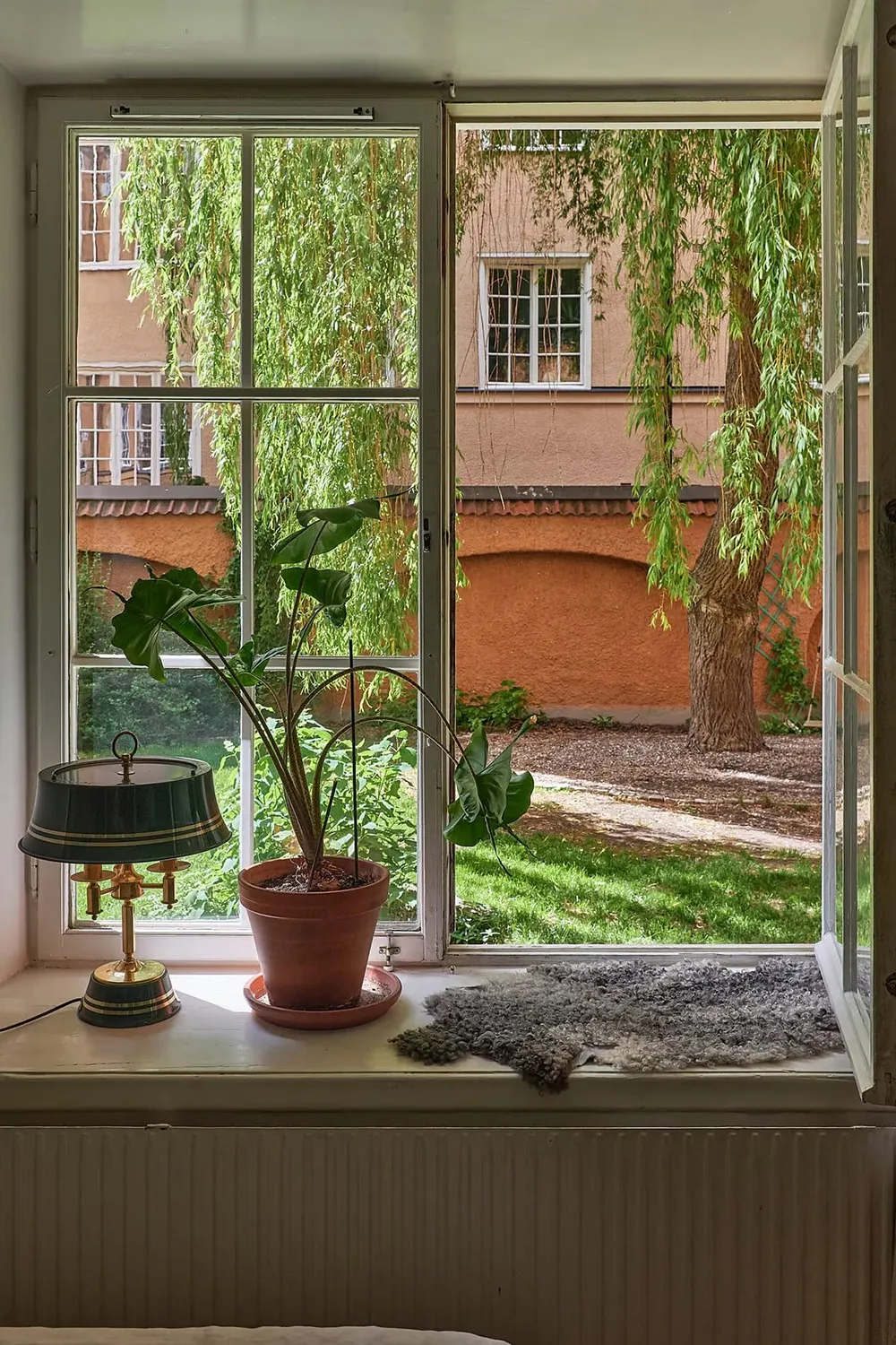 Tonos verdes y sofá a cuadros: apartamento en Estocolmo (47 m²) - Gallery image 19