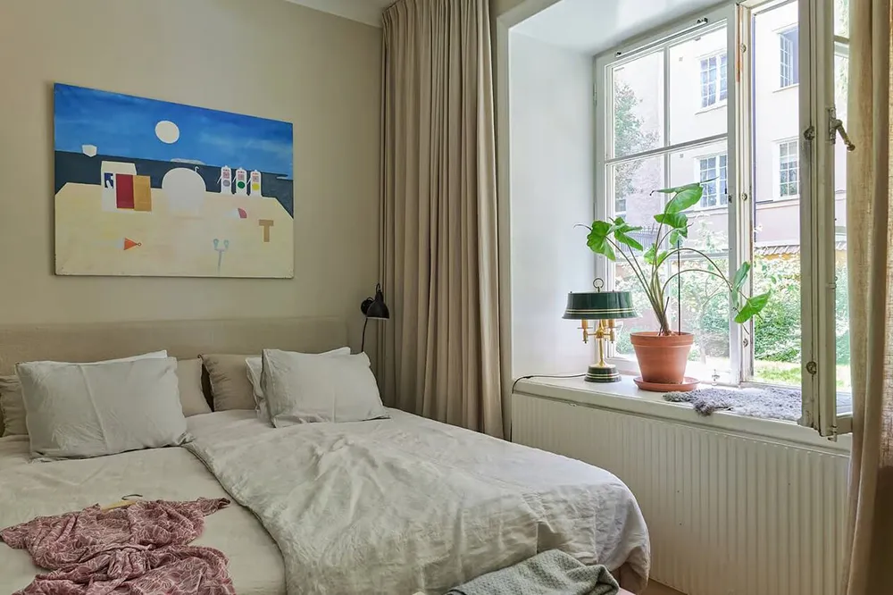 Tonos verdes y sofá a cuadros: apartamento en Estocolmo (47 m²) - Gallery image 10