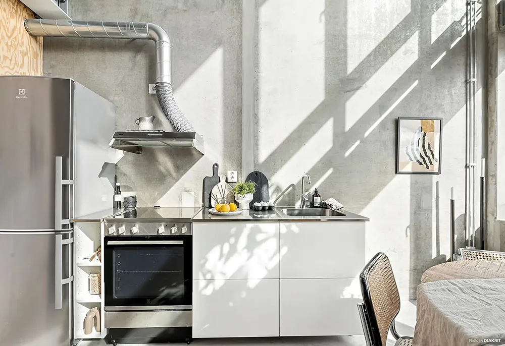 Paredes de concreto y espacio abierto: Loft en Suecia (43 m²) - Gallery image 12