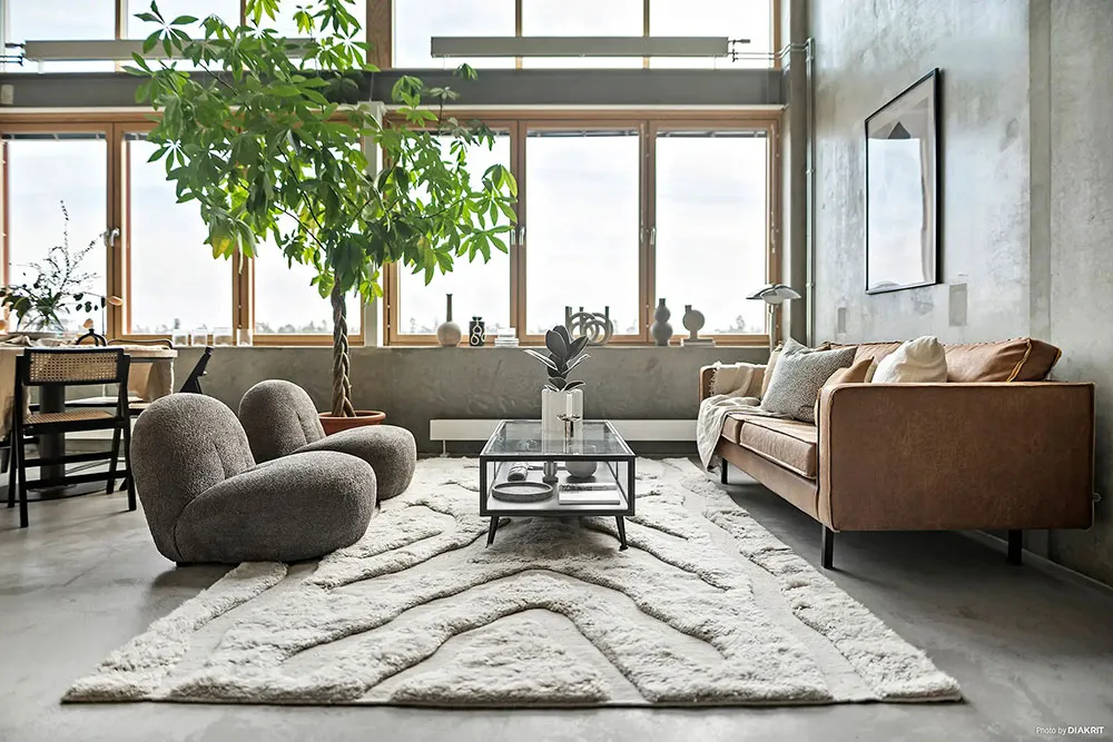 Paredes de concreto y espacio abierto: Loft en Suecia (43 m²) - Gallery image 2