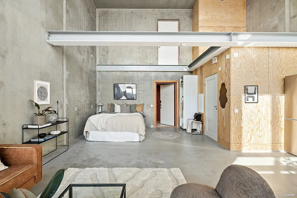 Paredes de concreto y espacio abierto: Loft en Suecia (43 m²) - Gallery image 9