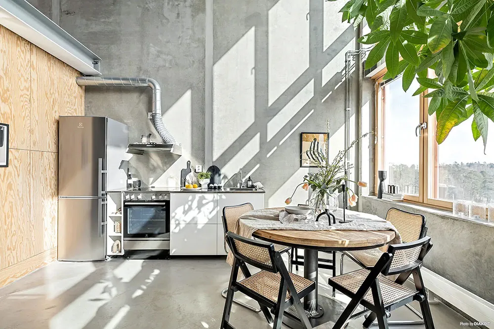 Paredes de concreto y espacio abierto: Loft en Suecia (43 m²) - Gallery image 13