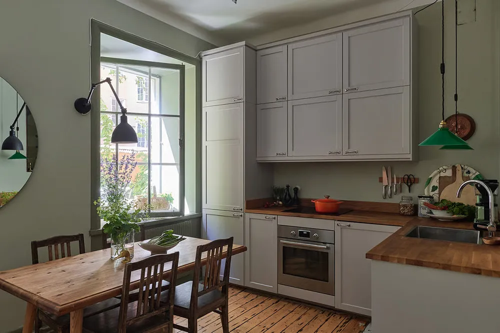 Tonos verdes y sofá a cuadros: apartamento en Estocolmo (47 m²) - Gallery image 4