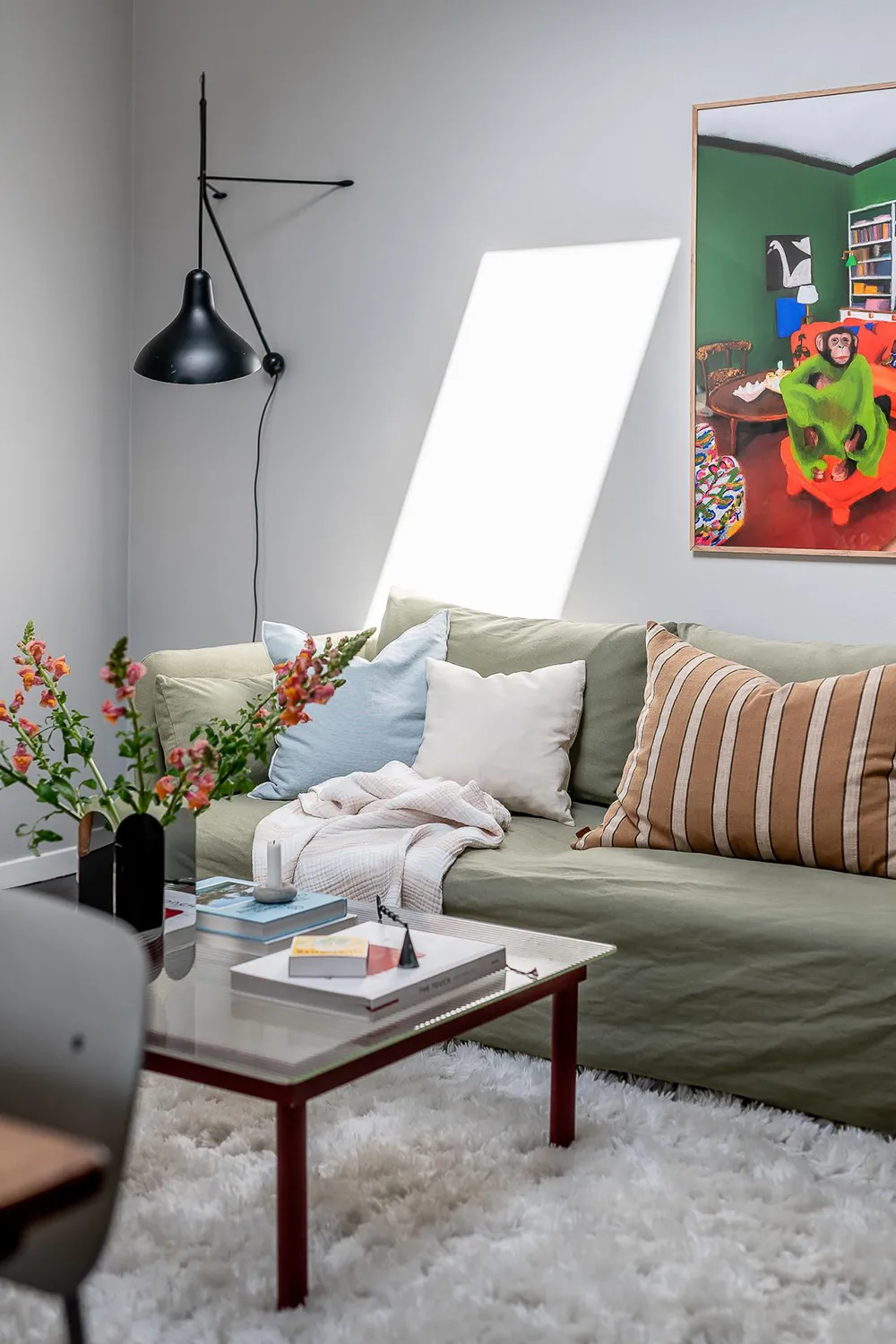 Olive Sofa and Gray Walls: Light Loft in Goteborg (62 sqm) - Gallery image 1
