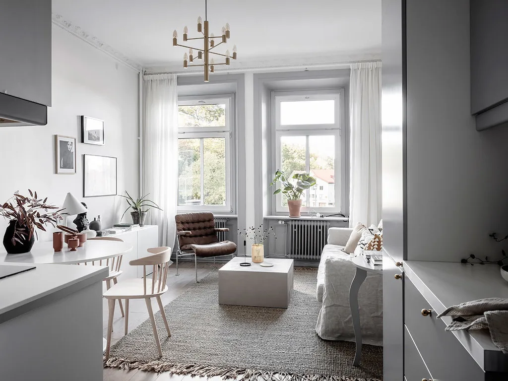 照片：斯堪的纳维亚风格客厅、Loft、室内设计、公寓、平面图、装饰、白色、灰色、2室、不超过40平方米 – 我们网站上的照片