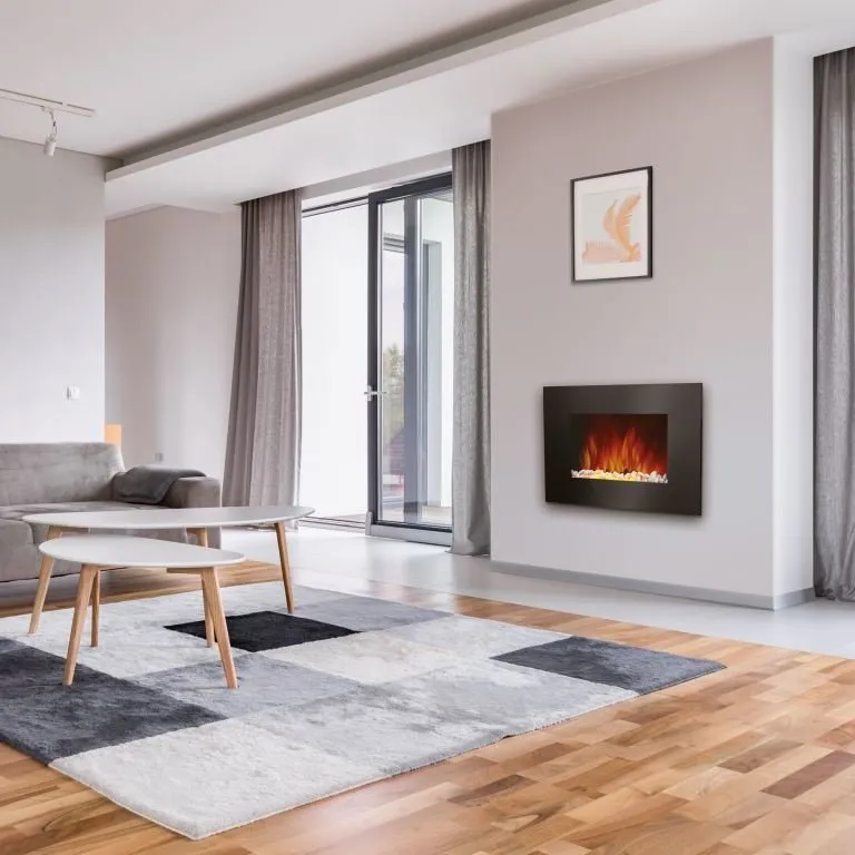 照片:极简风格客厅,技巧,室内设计中的电暖炉,城市公寓壁炉,公寓壁炉——我们网站上的照片