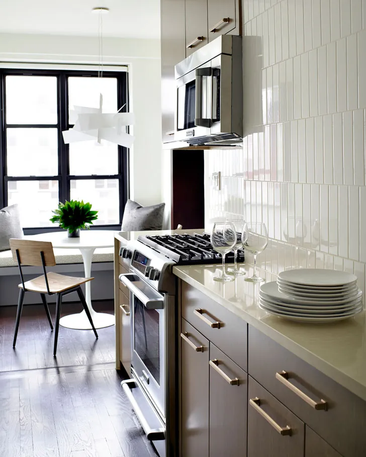 Strict Apartment Interior with Orange Accents in New York - 12