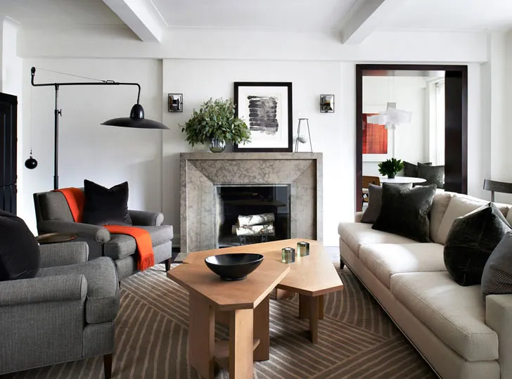 Strict Apartment Interior with Orange Accents in New York
