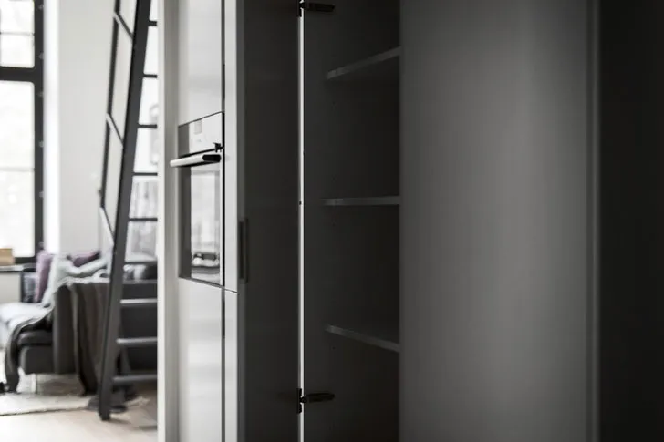 Невеликий чоловічий лофт у Стокгольмі (40 + 19 м²) - Gallery image 13