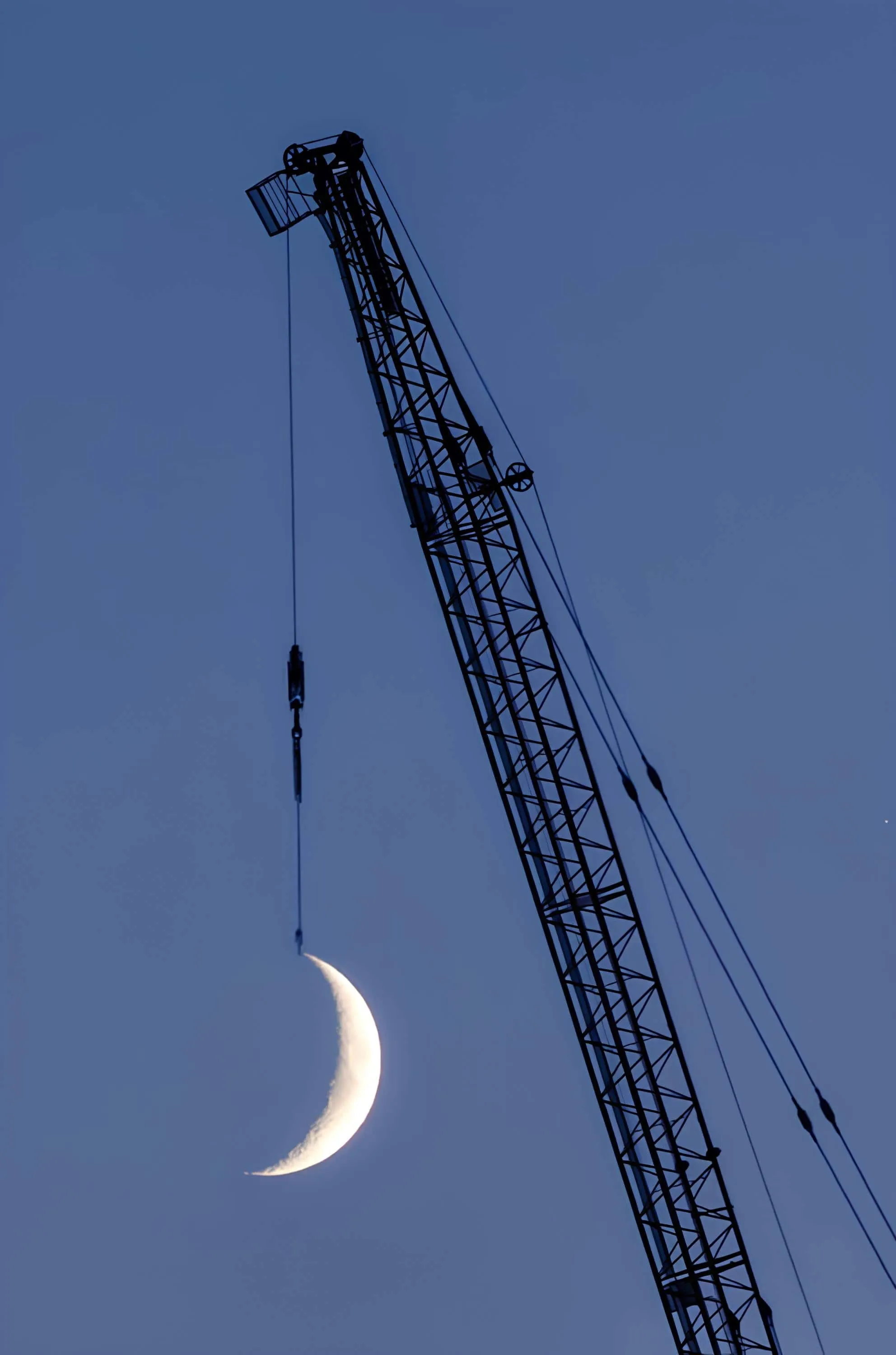 Half moon as if lifted by a crane