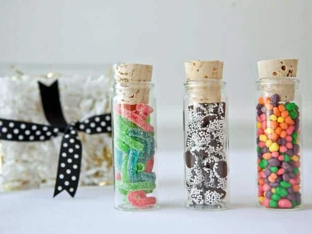 Candy-wrapped party favors with tags