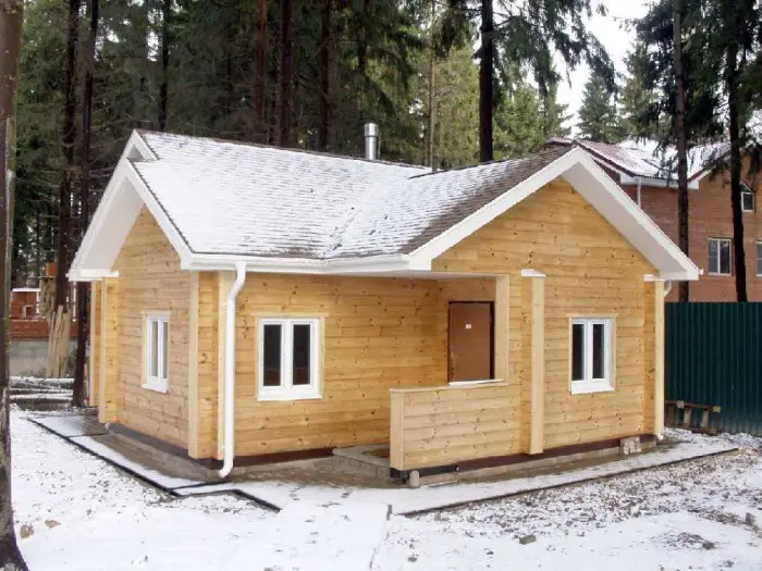 Log cabin from timber beam — from material selection to installation