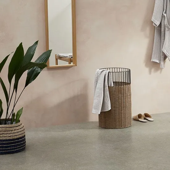 Fonctionnalité et style — panier en rattan pour linge sale