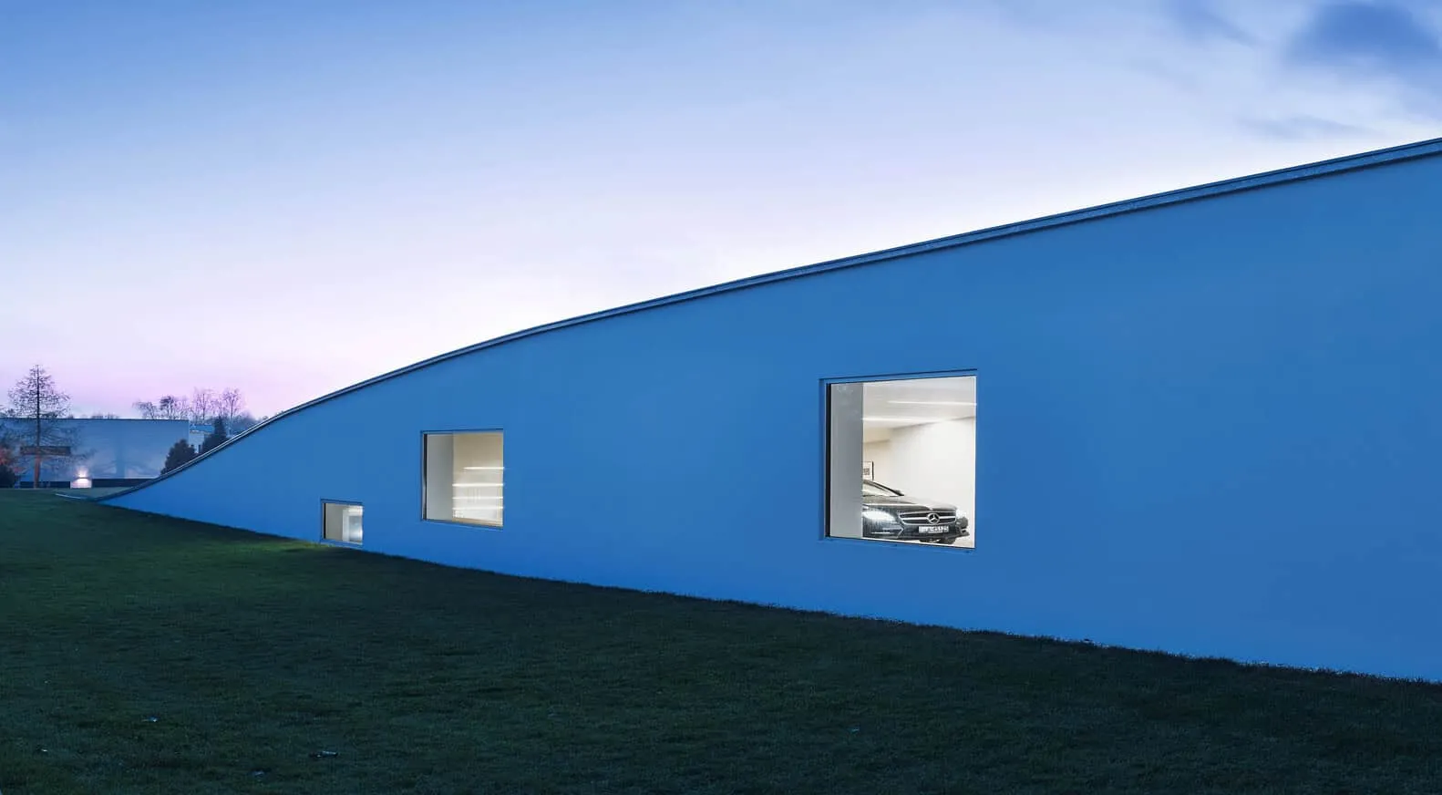 Autofamily House by KWK Promes: Where Architecture Meets the Automobile