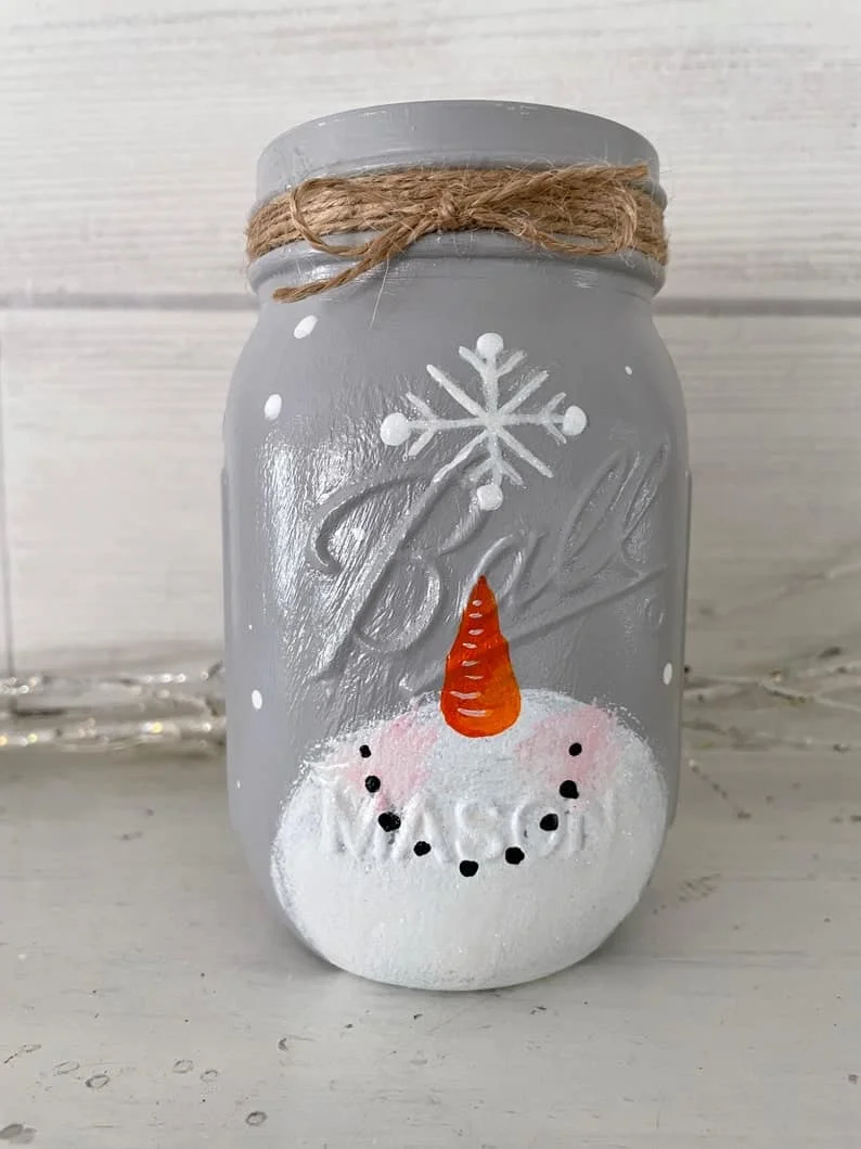 10. Frasco de mason con muñeco de nieve