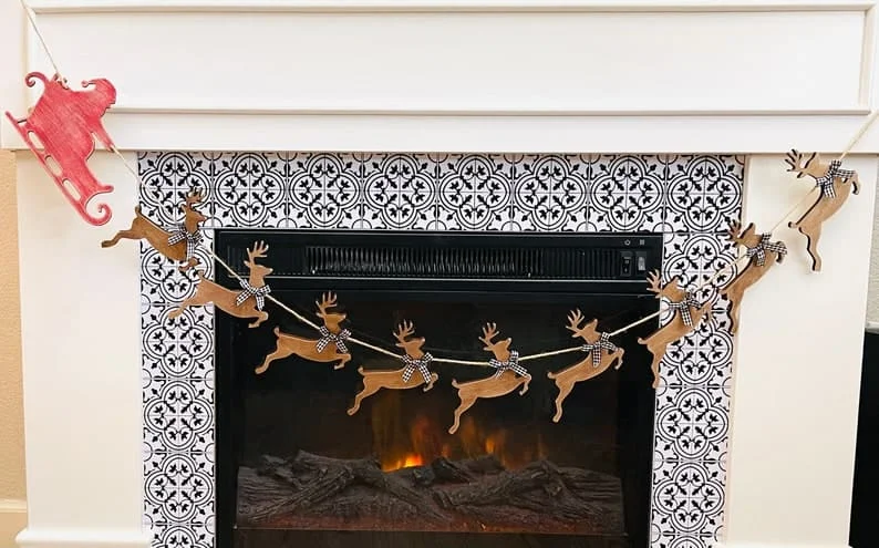 14. Banner und Girlande mit Schneekönigin-Schlitten und Rentieren