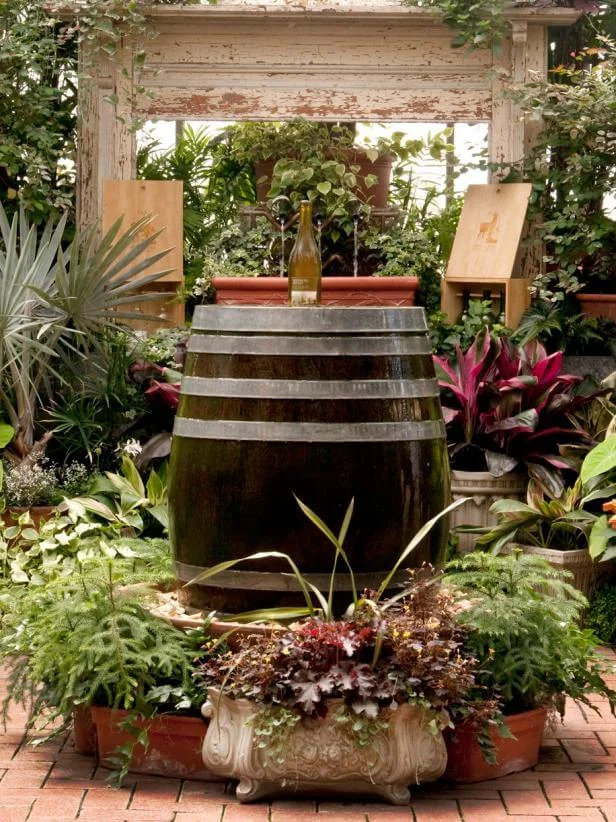 Create a Fountain from a Barrel and Bottles