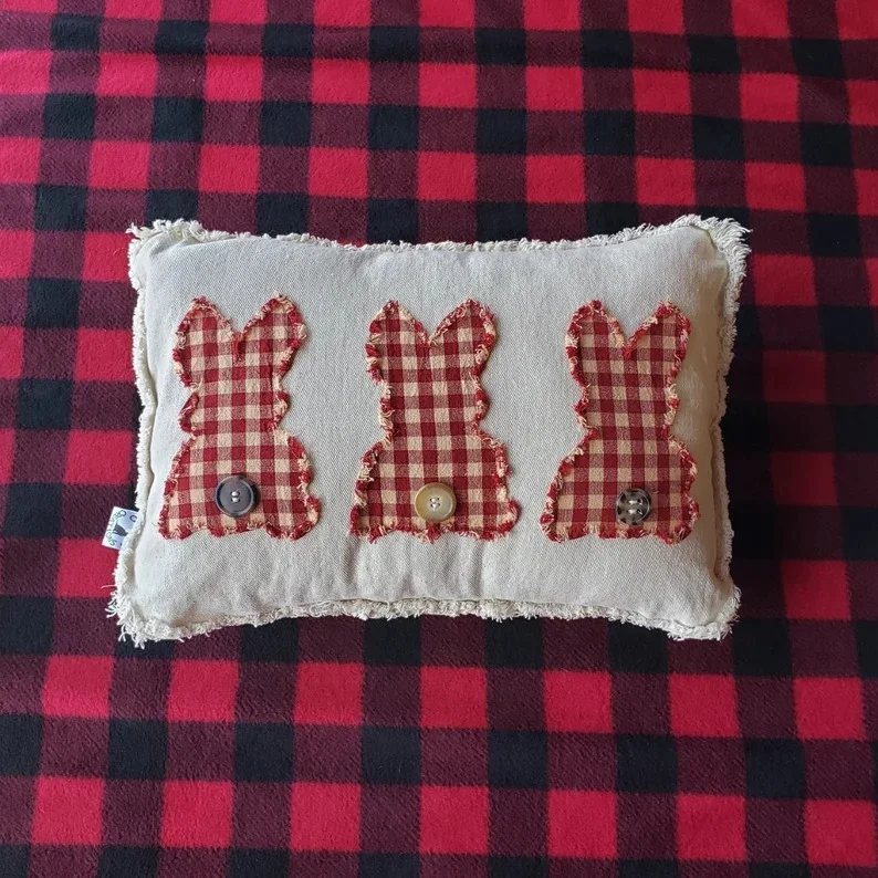 7. Cobertor para almohada con tres conejos