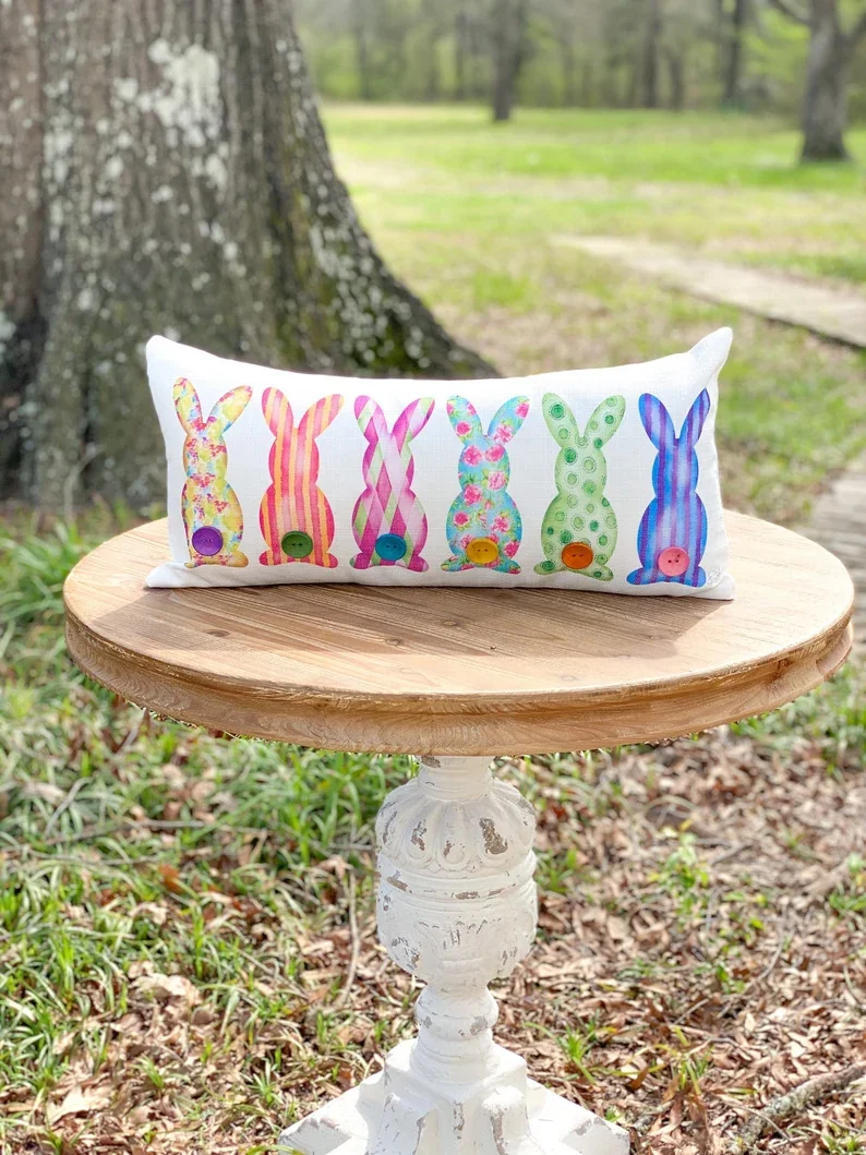 6. Almohada con colas de conejo