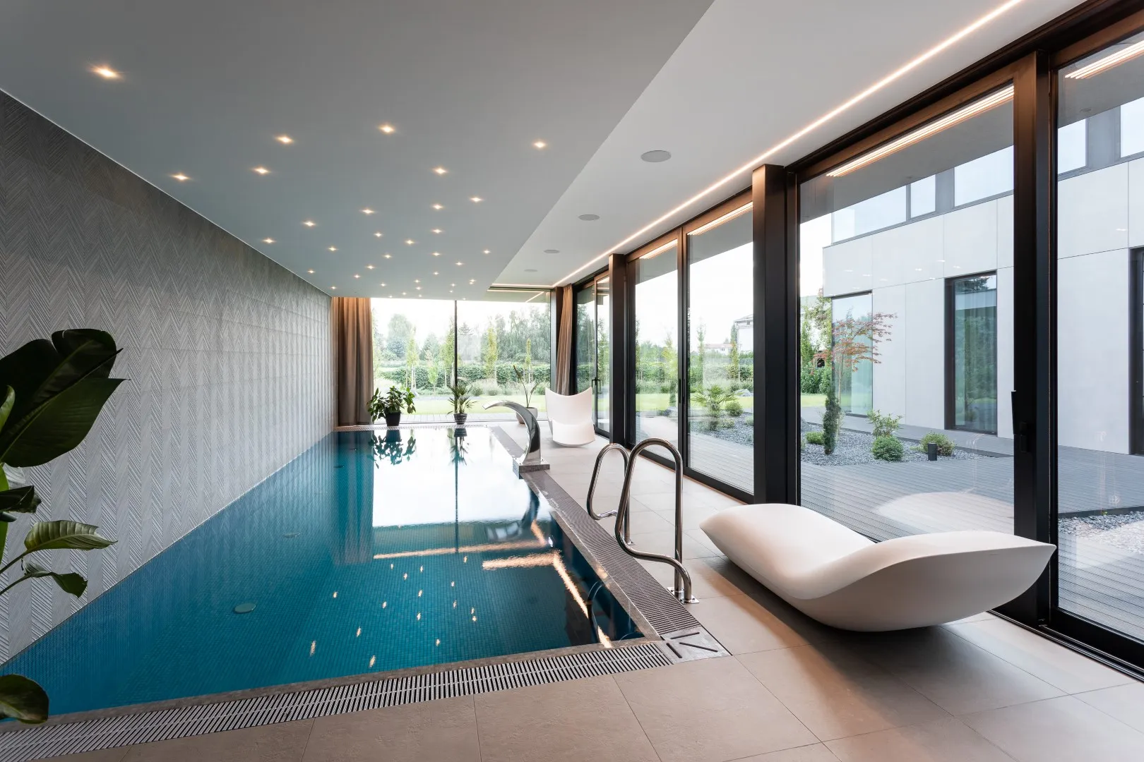 Single-Family House with Pool by EASST Architects in Poznan, Poland Single-Family House with Pool by EASST Architects in Poznan, Poland