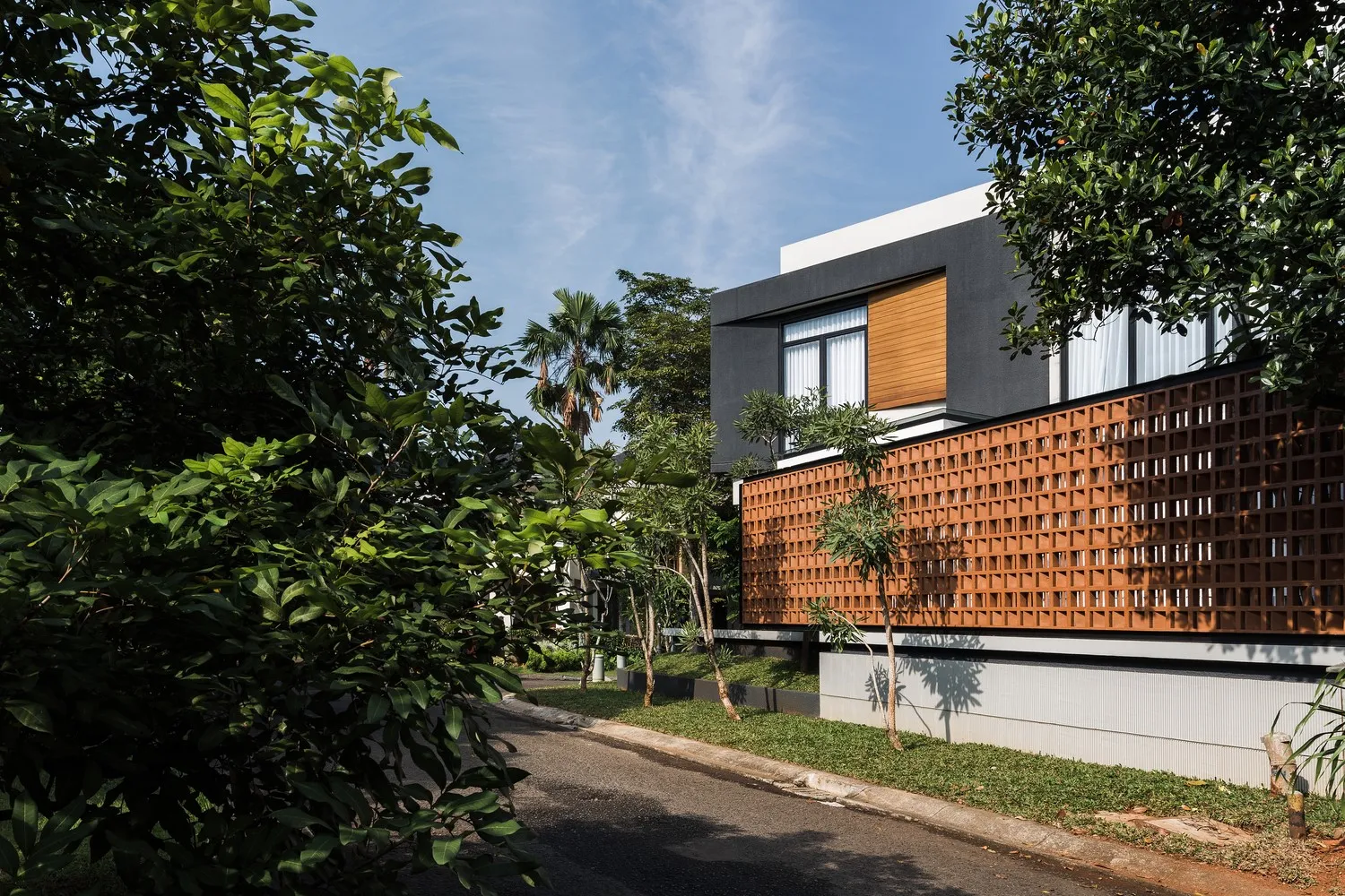 Curved Standalone House by Phidias Indonesia in Indonesia