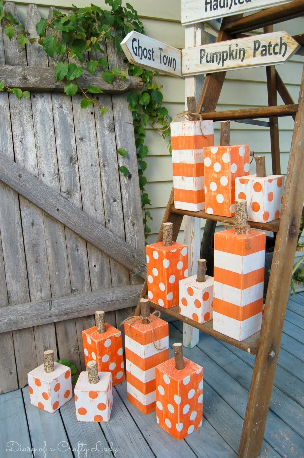 3. DIY Decor from Painted Pumpkins on 4x4 Posts