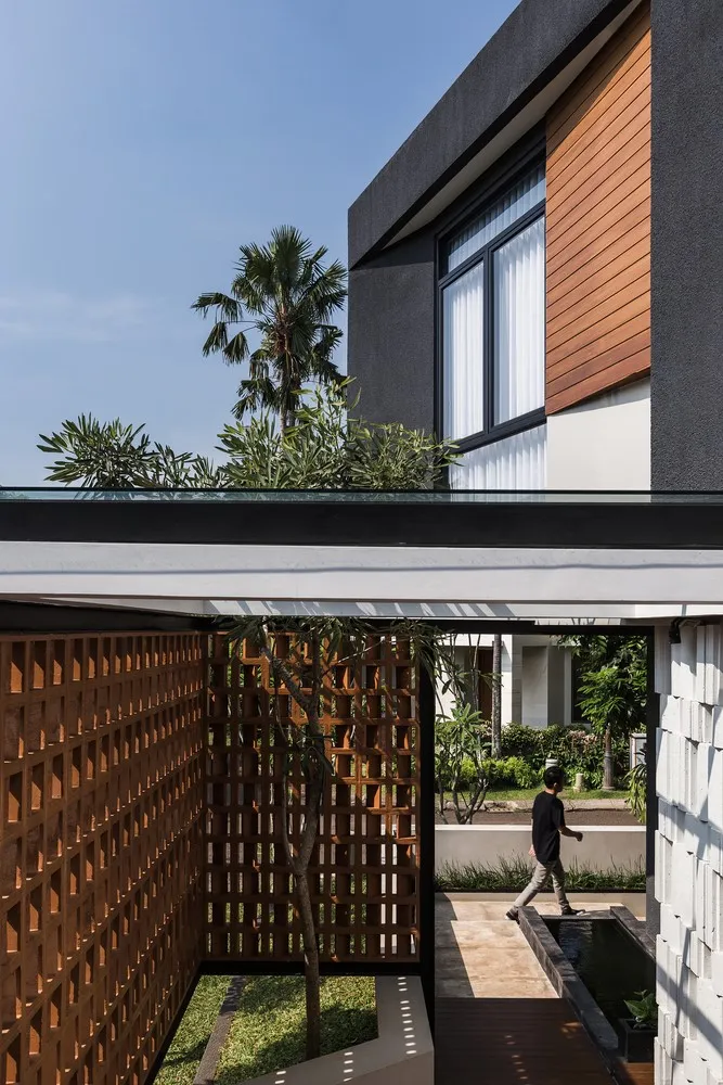 Curved Standalone House by Phidias Indonesia in Indonesia