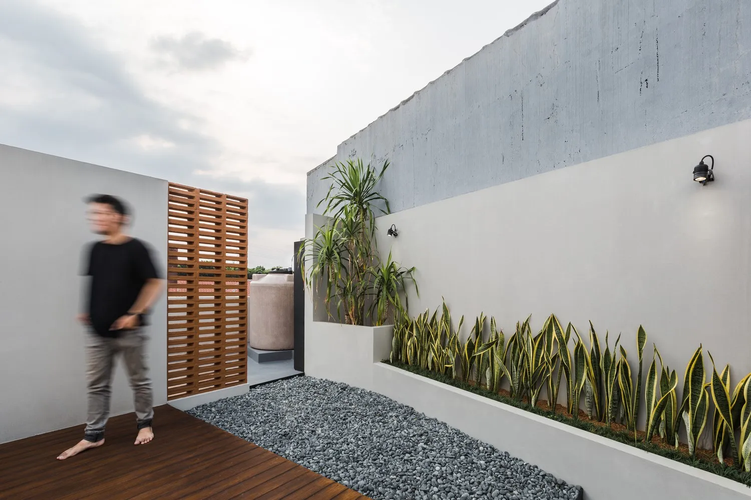 Curved Standalone House by Phidias Indonesia in Indonesia