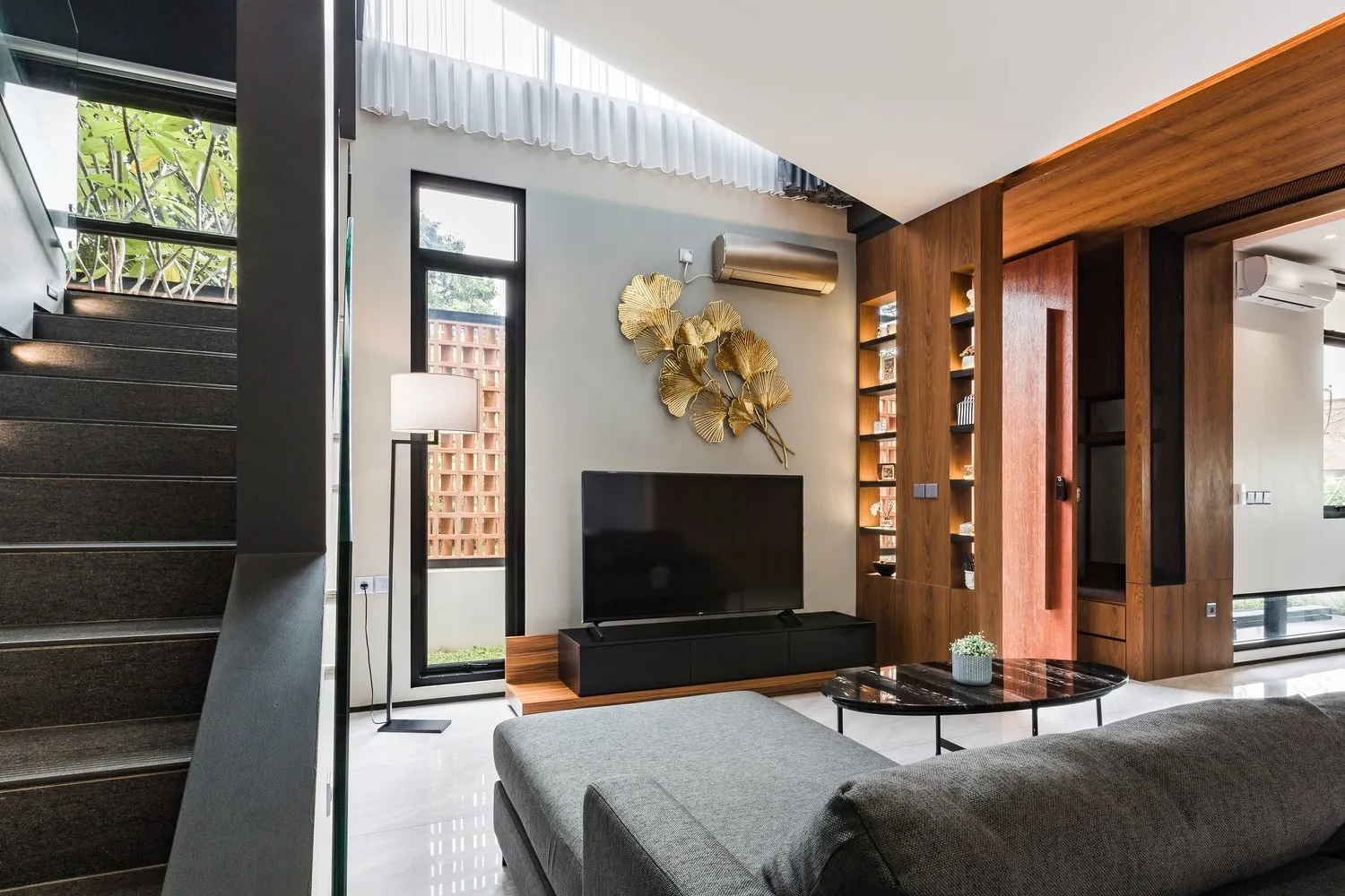 Curved Standalone House by Phidias Indonesia in Indonesia