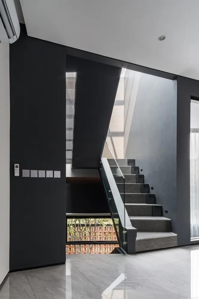 Curved Standalone House by Phidias Indonesia in Indonesia