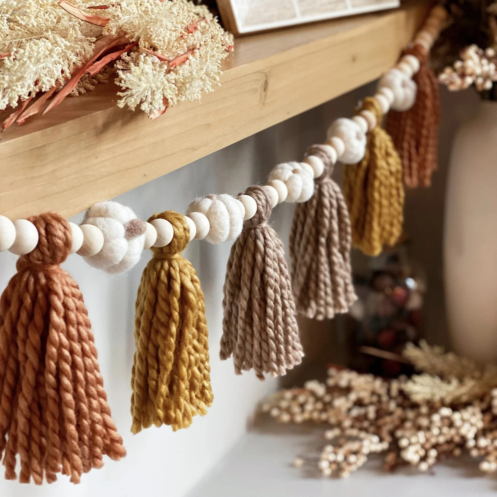 10. Pumpkin and Paintbrush Garland with Firelight