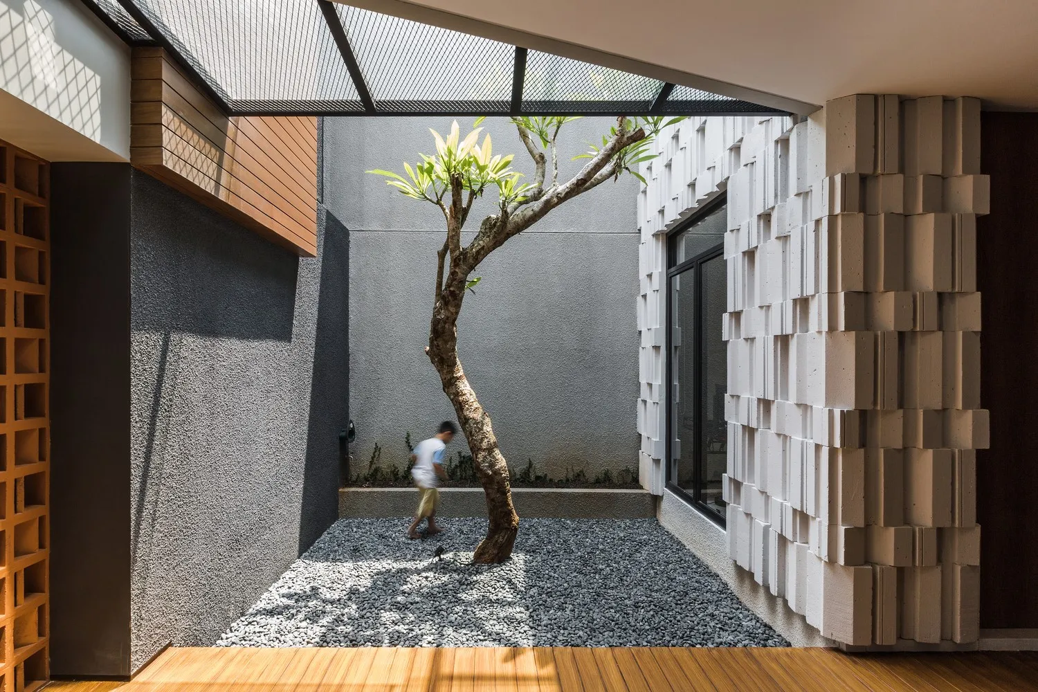 Curved Standalone House by Phidias Indonesia in Indonesia