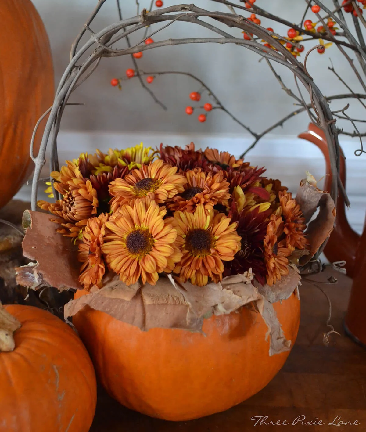 6. Pumpkin Bouquet with Flowers